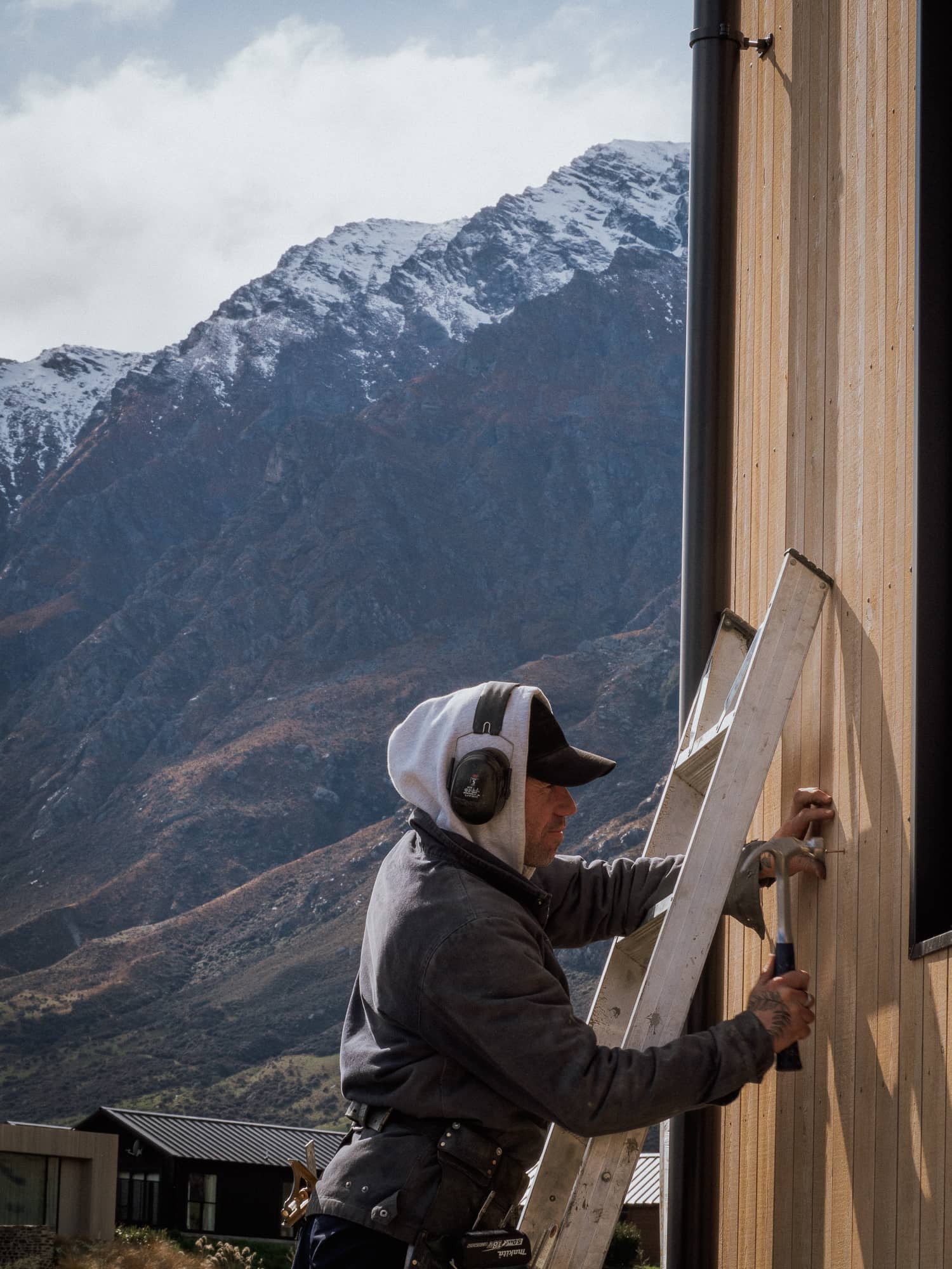 Cedar cladding being fixed at Jack's Point